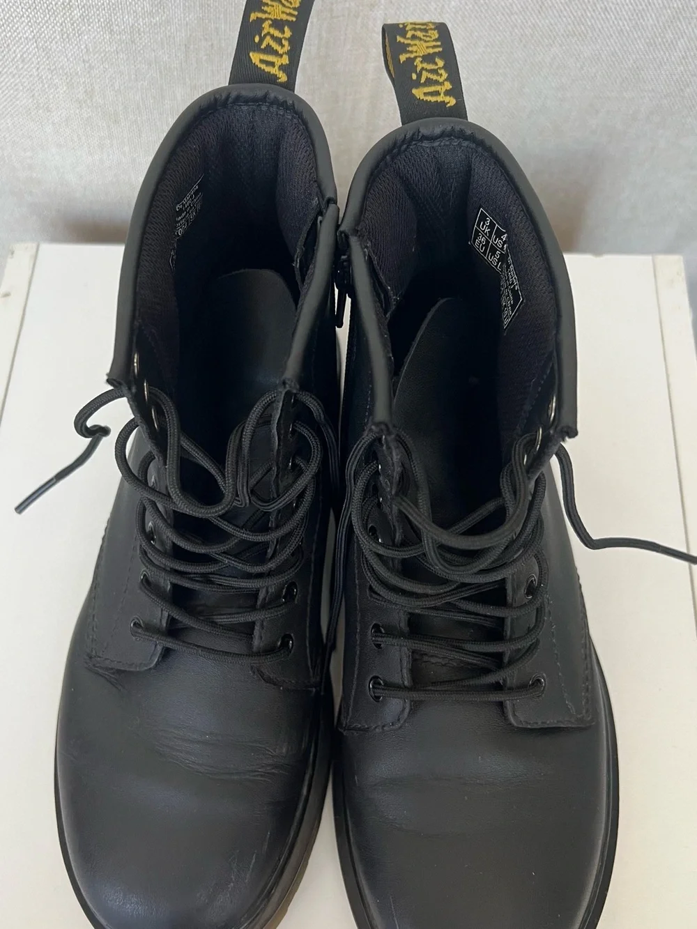 Dr. Martens Black Leather 8-Eye Lace-Up Boots with Yellow Stitching